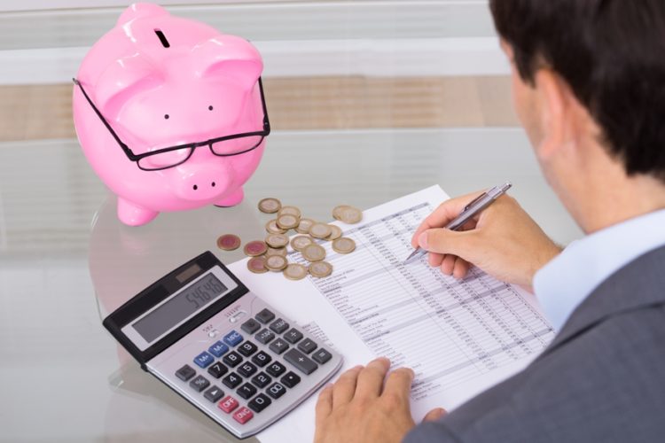 Man checking the balances of different types of savings account